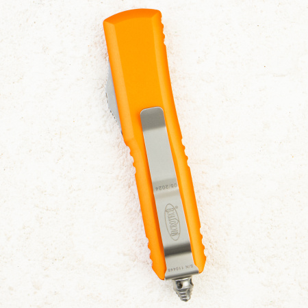 Нож Microtech UTX-85 Tanto, Serrated, Stonewash, M390, Aluminum Orange, 233-12 OR Нож Microtech UTX-85 Tanto, Serrated, Stonewash, M390, Aluminum Orange, 233-12 OR