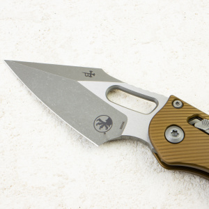 Нож Microtech Stitch RAM-LOK, Apocalyptic, M390, Aluminum Fluted OD Green, 169RL-10 Нож Microtech Stitch RAM-LOK, Apocalyptic, M390, Aluminum Fluted OD Green, 169RL-10