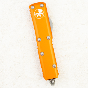 Нож Microtech UTX-85 Tanto, Serrated, Stonewash, M390, Aluminum Orange, 233-12 OR Нож Microtech UTX-85 Tanto, Serrated, Stonewash, M390, Aluminum Orange, 233-12 OR