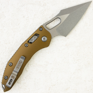 Нож Microtech Stitch RAM-LOK, Apocalyptic, M390, Aluminum Fluted OD Green, 169RL-10 Нож Microtech Stitch RAM-LOK, Apocalyptic, M390, Aluminum Fluted OD Green, 169RL-10