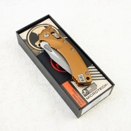 Нож Microtech Amphibian RAM-LOK,  Apocalyptic, M390, Aluminum Fluted Tan, 137RL-10 Нож Microtech Amphibian RAM-LOK,  Apocalyptic, M390, Aluminum Fluted Tan, 137RL-10