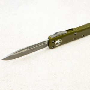 Нож Microtech UTX-85, Apocalyptic, M390, Aluminum OD Green, 231-10 Нож Microtech UTX-85, Apocalyptic, M390, Aluminum OD Green, 231-10