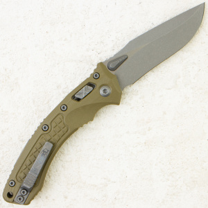 Нож Microtech Amphibian RAM-LOK, Apocalyptic, M390, G10 Frag OD Green, 137RL-10 Нож Microtech Amphibian RAM-LOK, Apocalyptic, M390, G10 Frag OD Green, 137RL-10