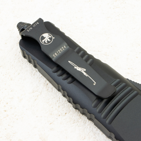 Нож Microtech Mini Troodon Hellhound, Tactical, M390, Aluminum Black, 819-1 TS, (Signature Series) Нож Microtech Mini Troodon Hellhound, Tactical, M390, Aluminum Black, 819-1 TS, (Signature Series)
