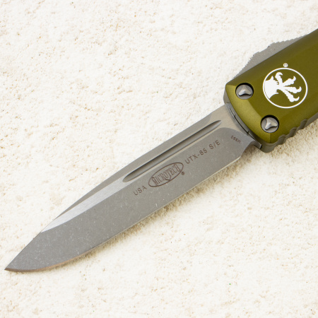 Нож Microtech UTX-85, Apocalyptic, M390, Aluminum OD Green, 231-10 Нож Microtech UTX-85, Apocalyptic, M390, Aluminum OD Green, 231-10