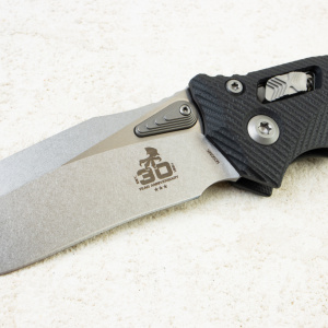 Нож Microtech Amphibian 30th Anniversary RAM-LOK,  Stonewash, M390, G10 Fluted Black, 137RL-10 Нож Microtech Amphibian 30th Anniversary RAM-LOK,  Stonewash, M390, G10 Fluted Black, 137RL-10