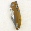 Нож Microtech Stitch RAM-LOK, Apocalyptic, M390, Aluminum Fluted OD Green, 169RL-10 Нож Microtech Stitch RAM-LOK, Apocalyptic, M390, Aluminum Fluted OD Green, 169RL-10