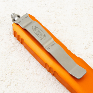 Нож Microtech UTX-85 Tanto, Serrated, Stonewash, M390, Aluminum Orange, 233-12 OR Нож Microtech UTX-85 Tanto, Serrated, Stonewash, M390, Aluminum Orange, 233-12 OR