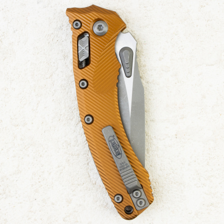 Нож Microtech Amphibian RAM-LOK,  Apocalyptic, M390, Aluminum Fluted Tan, 137RL-10 Нож Microtech Amphibian RAM-LOK,  Apocalyptic, M390, Aluminum Fluted Tan, 137RL-10